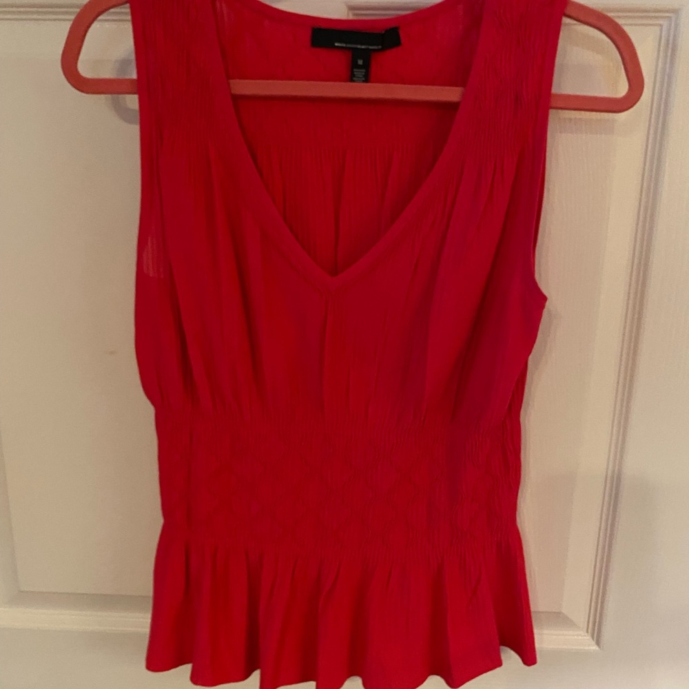 White House Black Market knit peplum top. Size medium